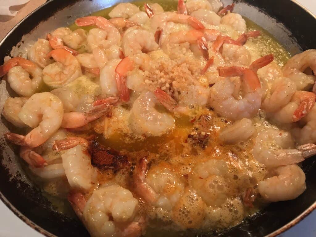 added seasoning to shrimp in garlic sauce