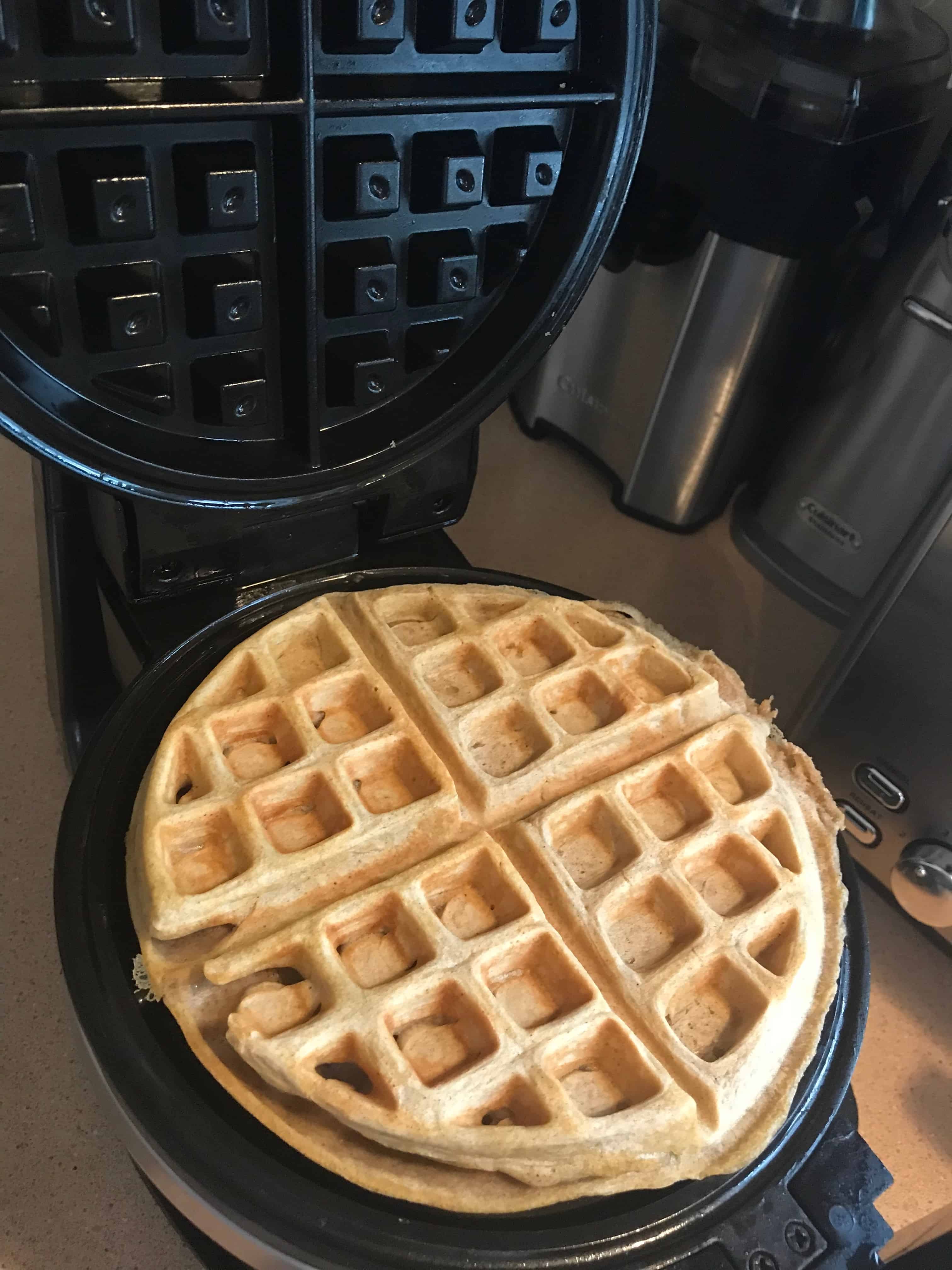 Cooked waffle in waffle iron