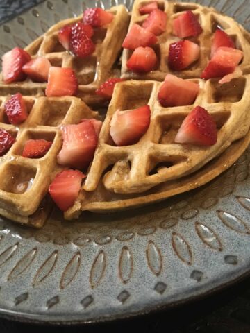 Homemade Waffles topped with strawberries