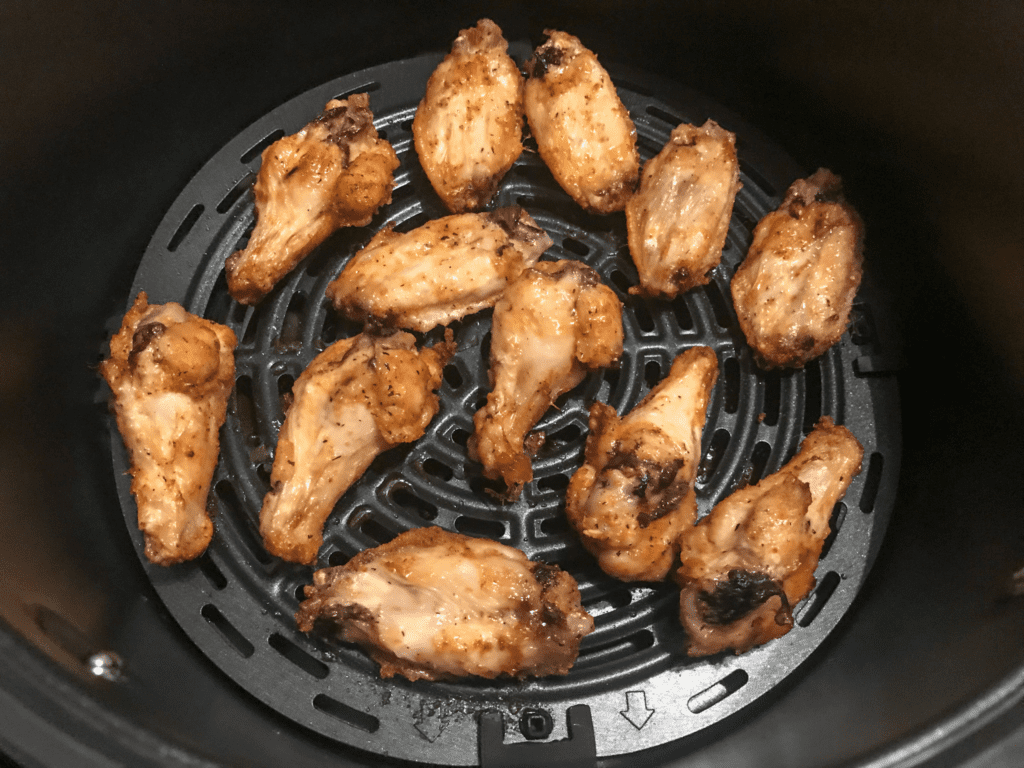 flipped chicken wings in air fryer basket