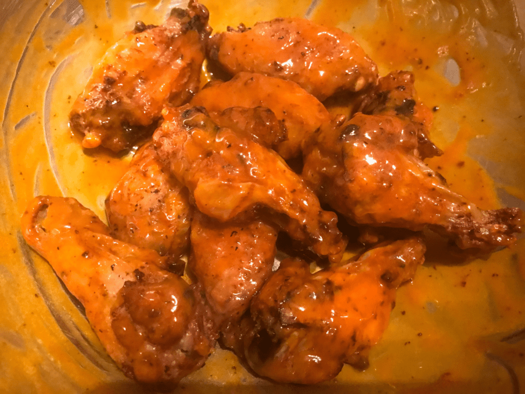 chicken wings coated in buffalo sauce
