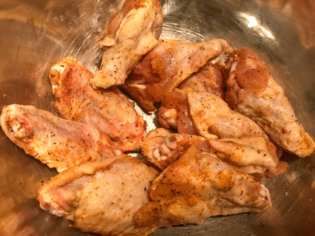 chicken wing pieces coated with seasoning