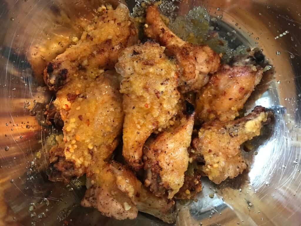 Chicken wings tossed in garlic parmesan sauce