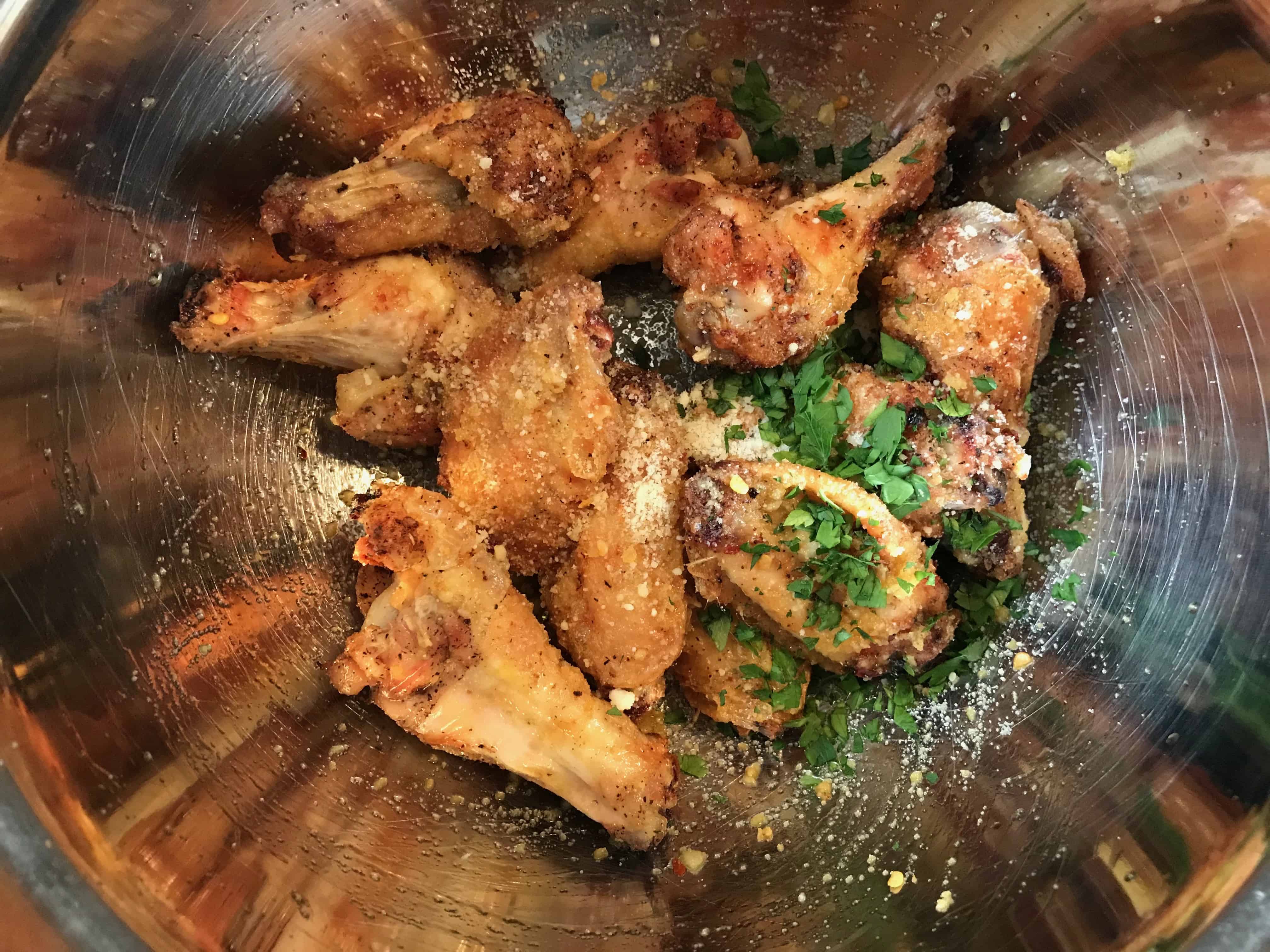 Parsley and parmesan cheese added to wings