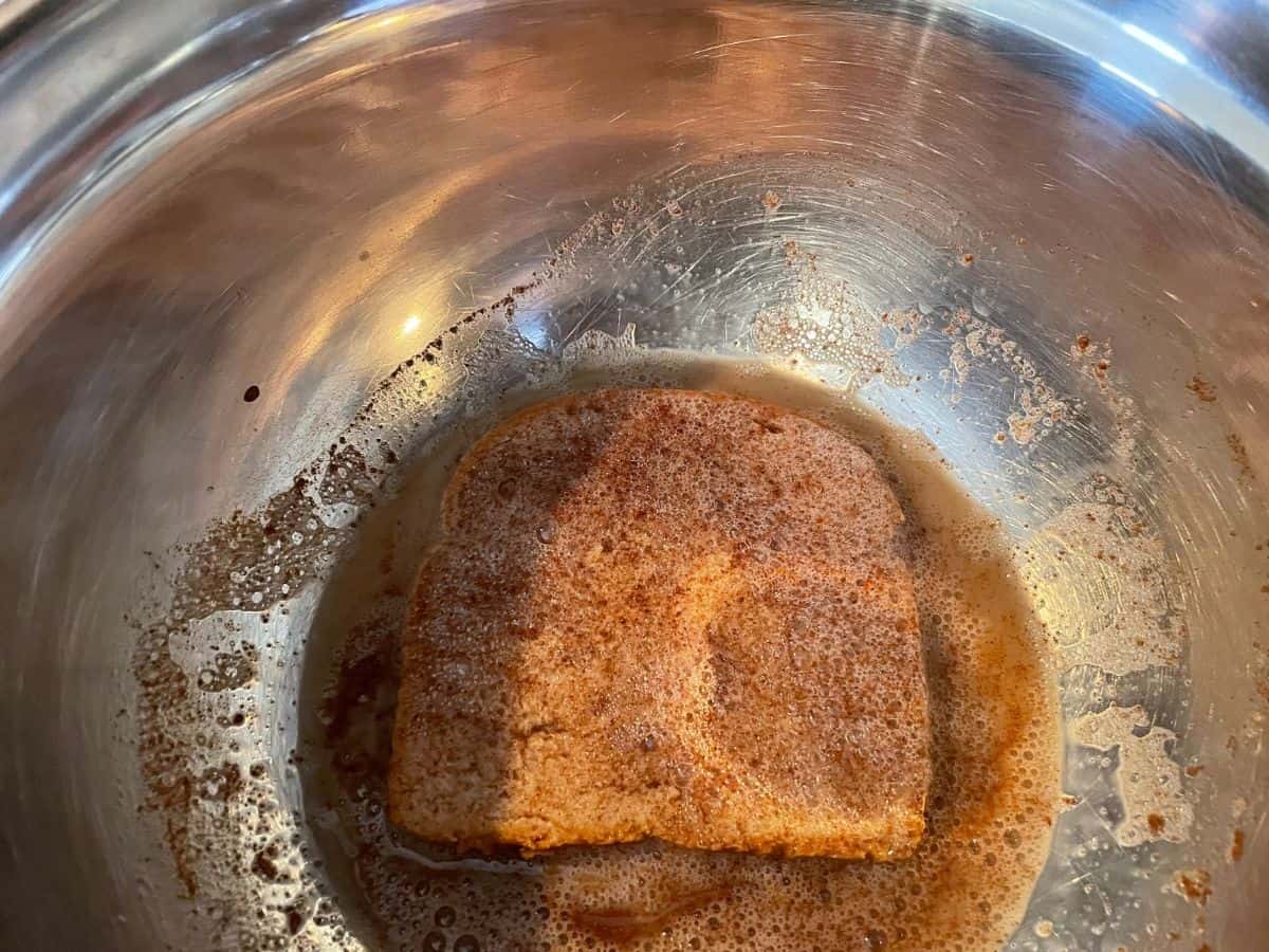 slice of bread in French toast batter