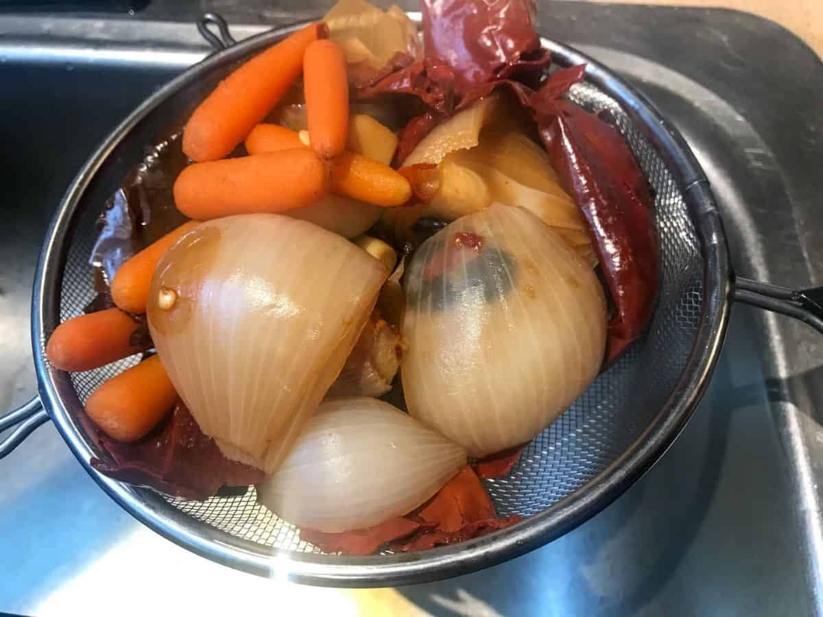 strained veggies from boiling pot