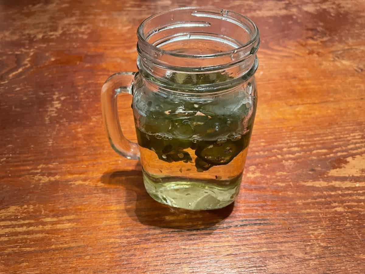 Jalapeno simple syrup in glass mason jar