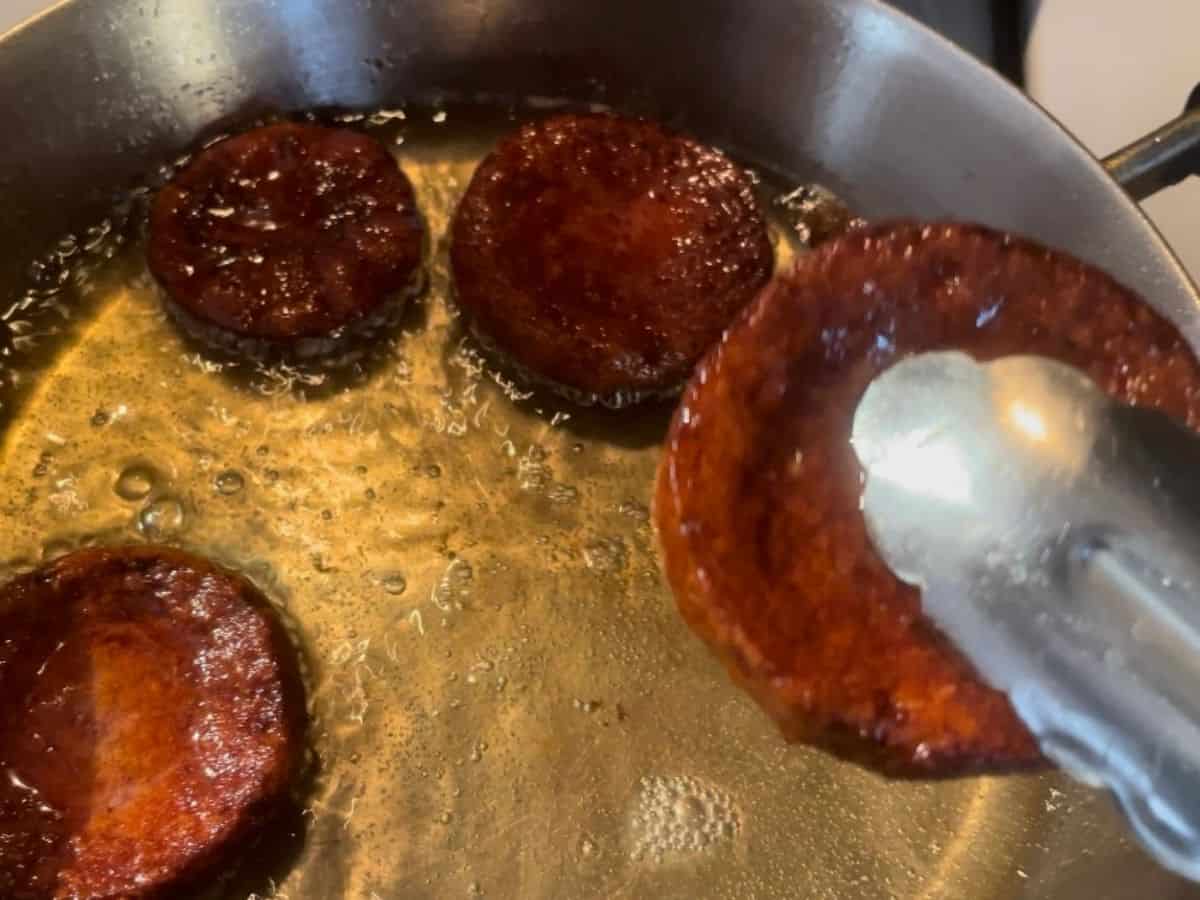 cooked salami in hot oil