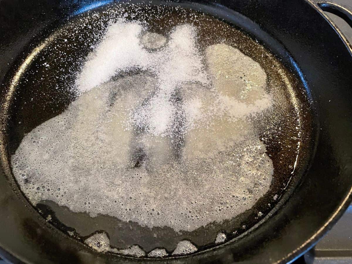 melted butter and sugar in a cast iron skillet