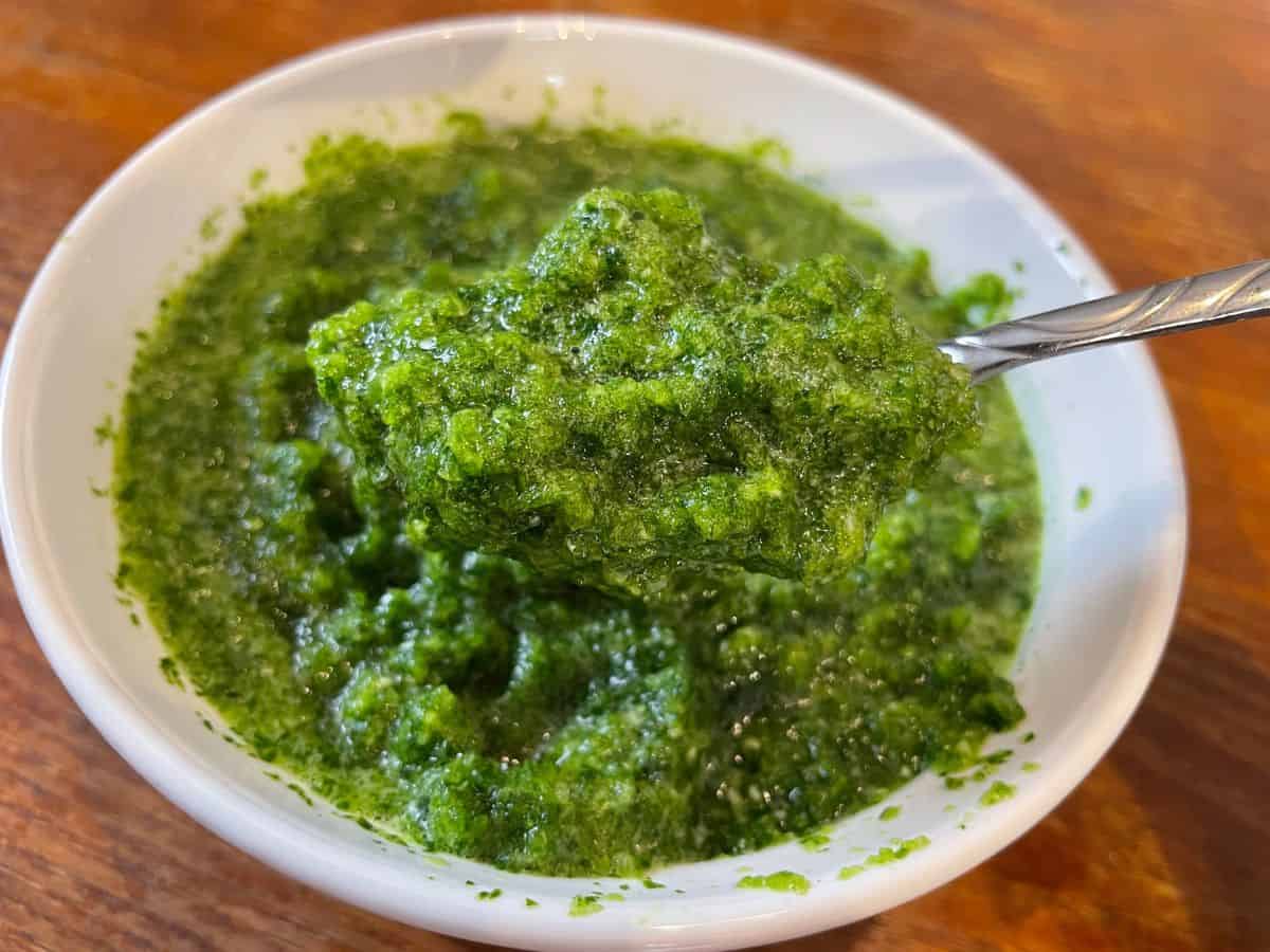 close up of spoonful of sofrito