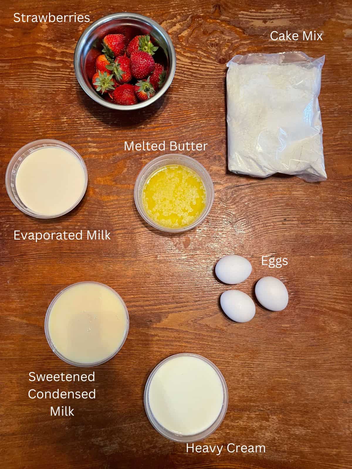 overhead shot of tres leches cake ingredients