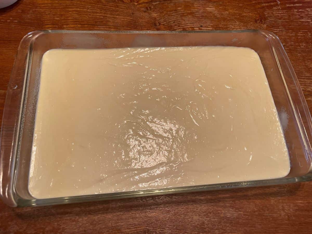cake batter in a glass pan