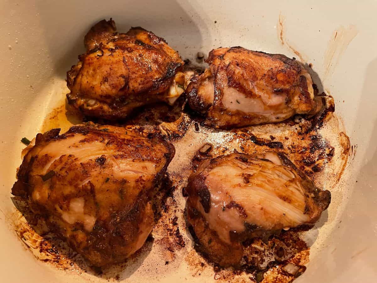 browning chicken thighs in a large dutch oven