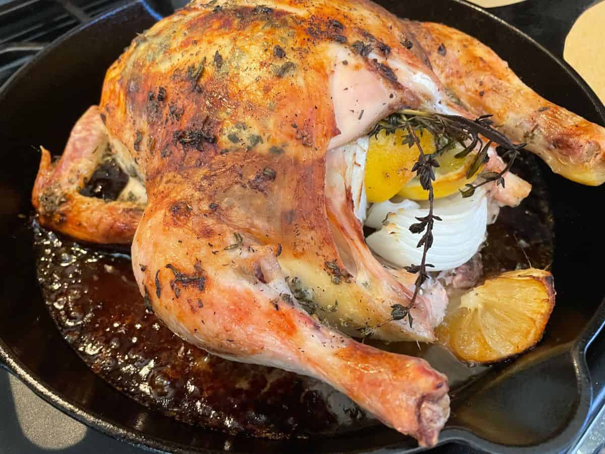 roasted chicken cooked in cast iron skillet