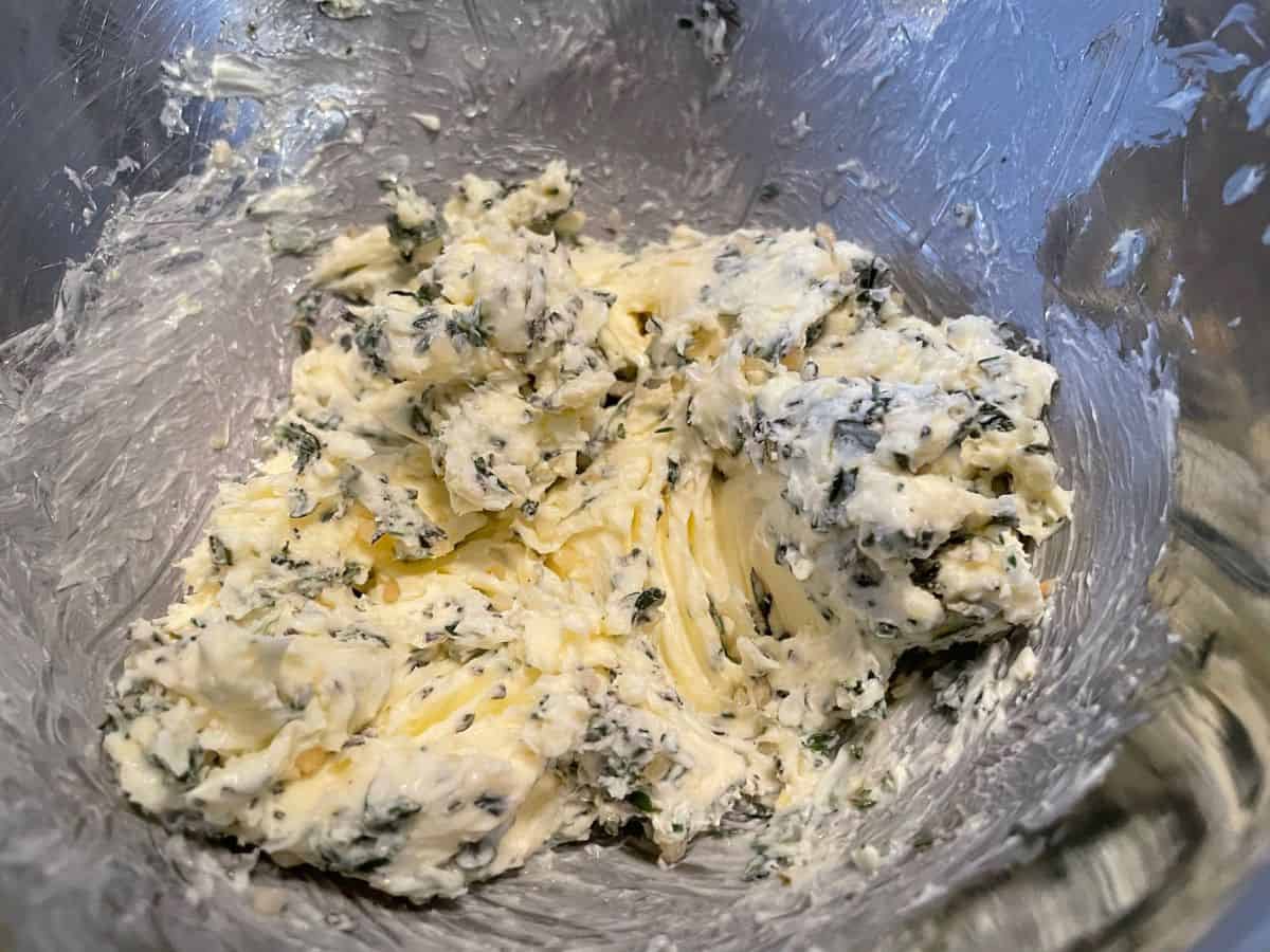 garlic herb butter mixed together in a small bowl