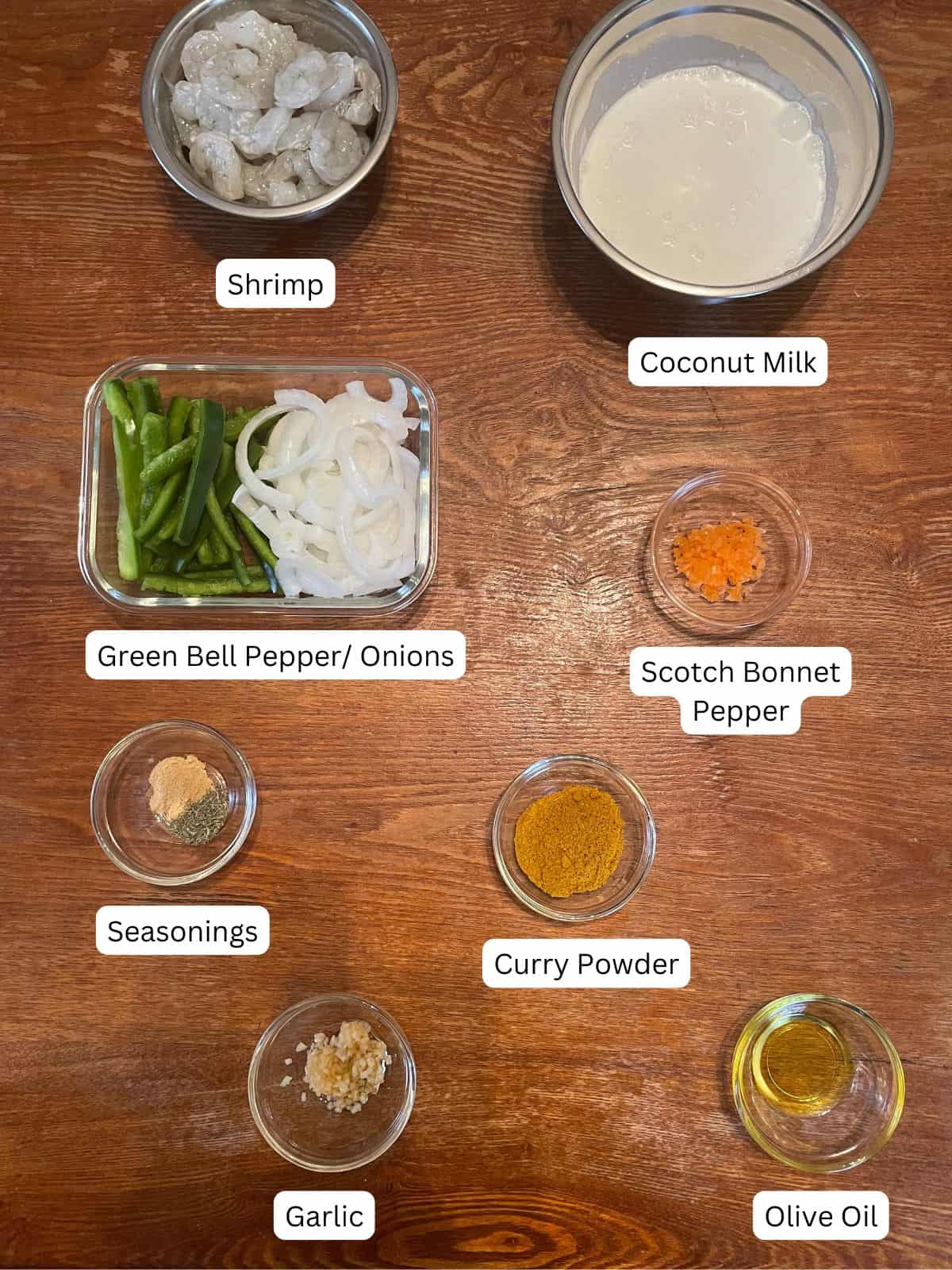 overhead shot of labeled ingredients for Jamaican curry shrimp